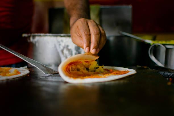 Making fresh dosas